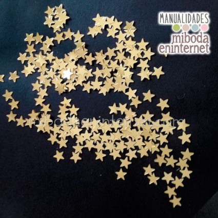 Confetti oro estrellas decoracion mesas