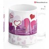 Taza con diseño de Edificios simbólicos de ciudades de todo el mundo junto a corazones.