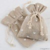 Bolsa beige corazones blancos